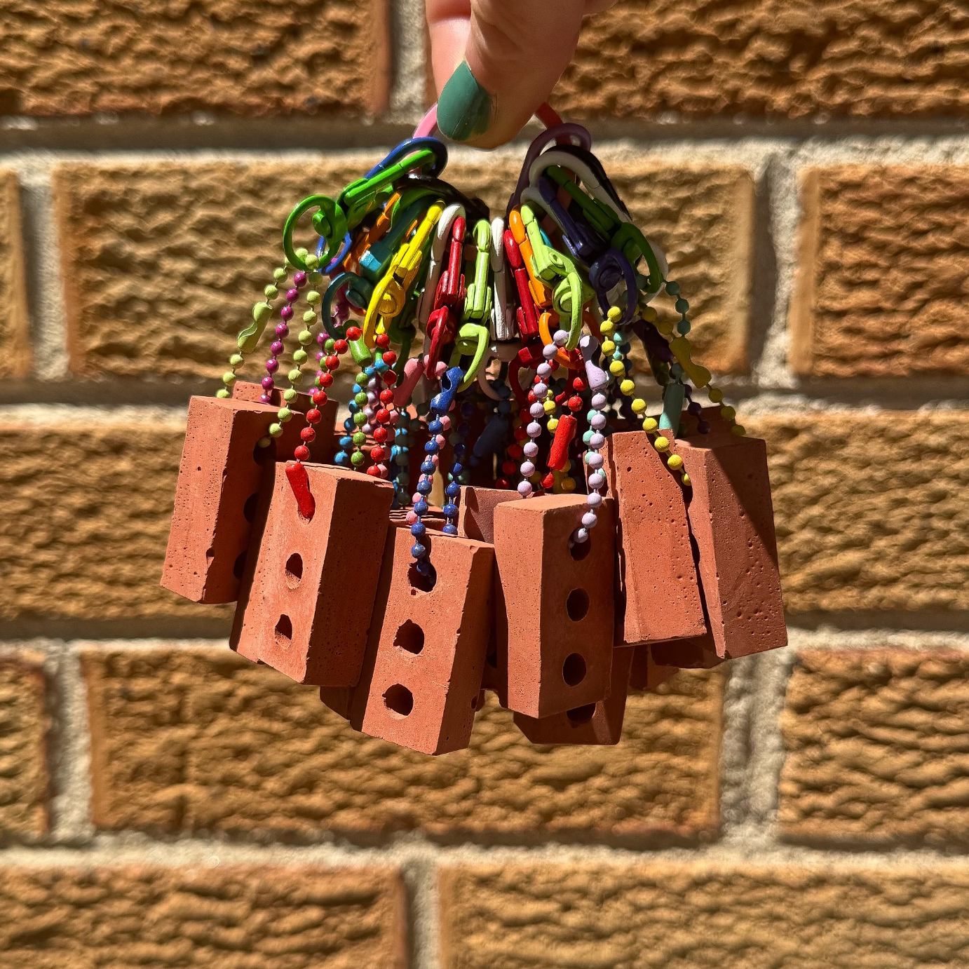 "Pride is a Protest" Brick Keychain
